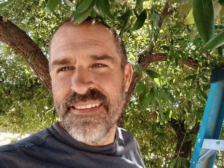 Odis Bynum, owner of Bynum Tree and Landscape, on a tree service job in Mesa, Arizona